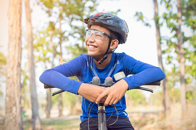 Young boy wearing his sports eyeglasses