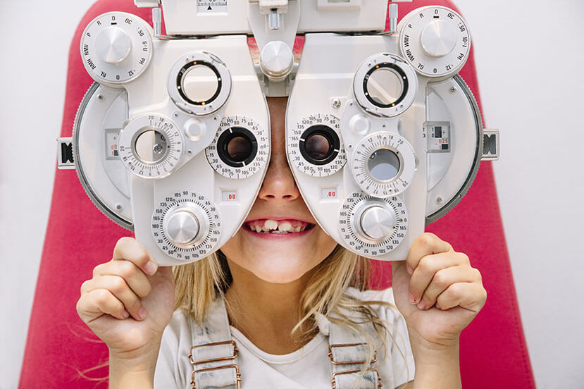 Young girl getting an eye exam